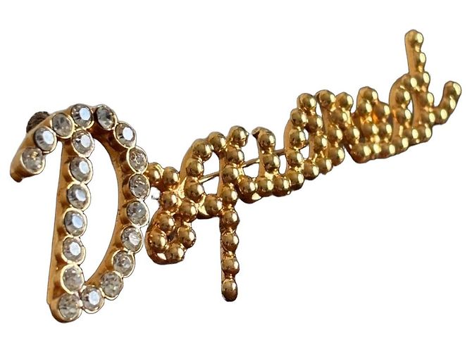 Dsquared2 Spilla "Dream" in metallo dorato con strass Argento D'oro
