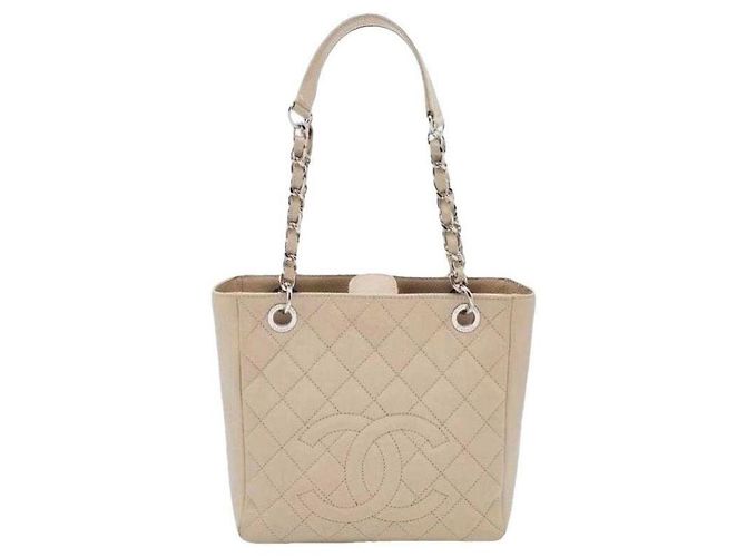 Bolsa de compras pequena Chanel em couro caviar bege