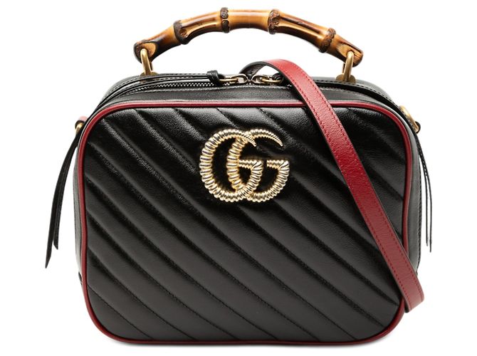 Bolsa de couro matelassé diagonal GG Marmont preta pequena com torchon e bambu da Gucci Preto