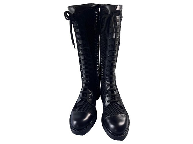 Botas altas Prada em couro e malha preta