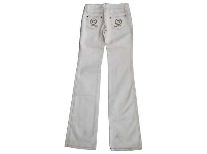Vaqueros acampanados Alexander McQueen cristales Swarovski blancos