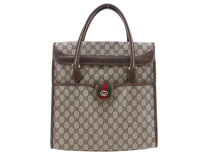 Bolsa de mão em PVC GG entrelaçado Gucci