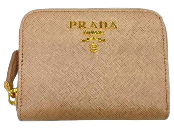 Monedero redondo con cremallera Prada en rosa beige