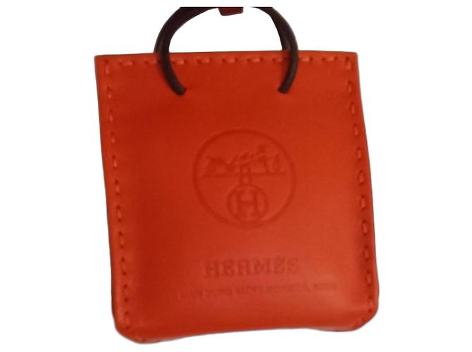 Bijou de sac Hermès en cuir orange 