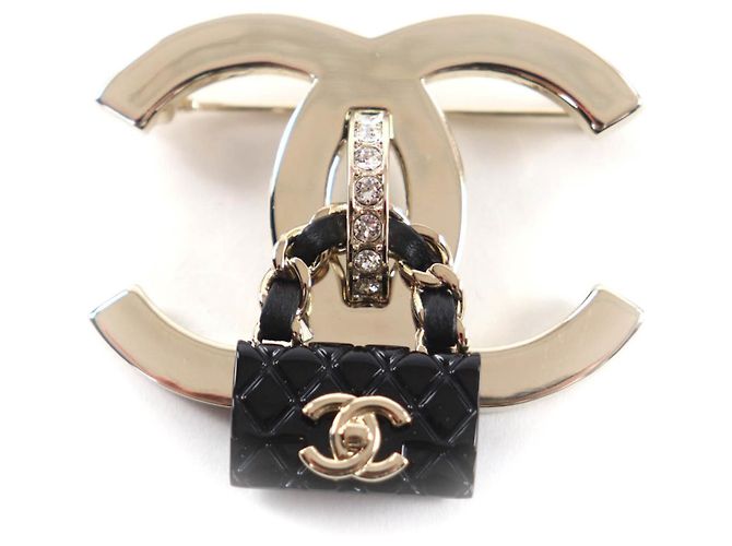 Spilla per borsa Chanel B23C Coco Mark Nero D'oro