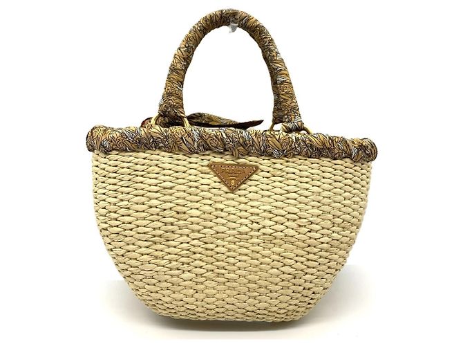 Borsa in rafia con frange Prada