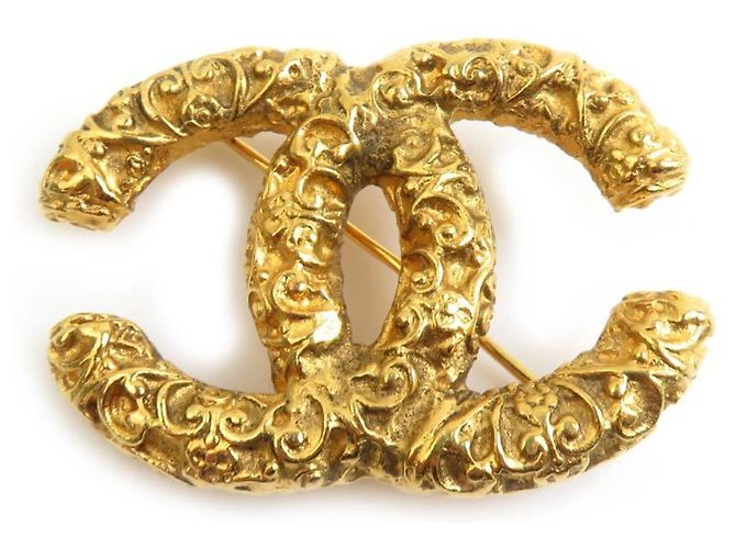 Chanel Brosche aus goldfarbenem Metall Golden