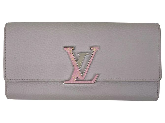Billetera Capucines de cuero Louis Vuitton con monedero