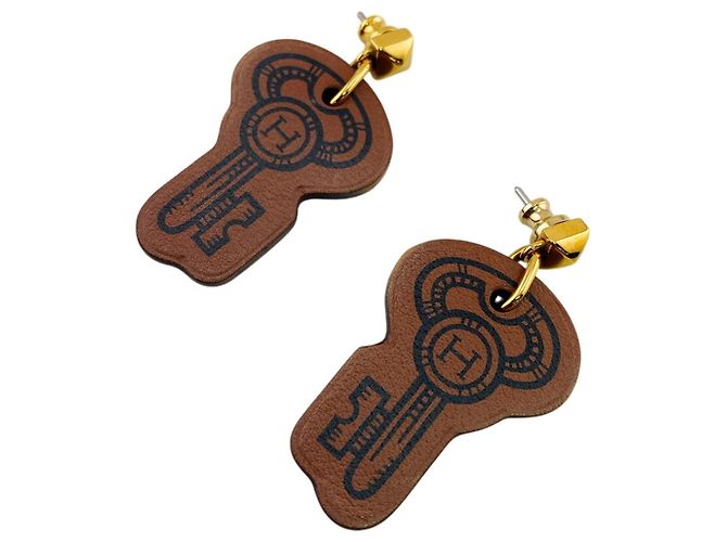 H Curiosité Ohrringe von Hermès Braun 