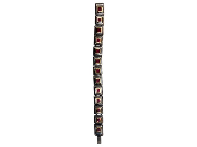 Pulseira Yves Saint Laurent em tom prateado