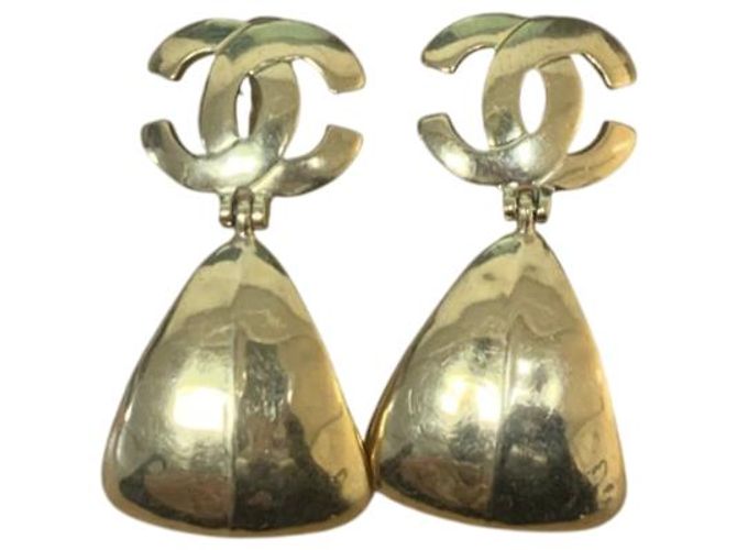 Timeless Brincos pendentes de clipe em tom dourado Chanel Coco Mark