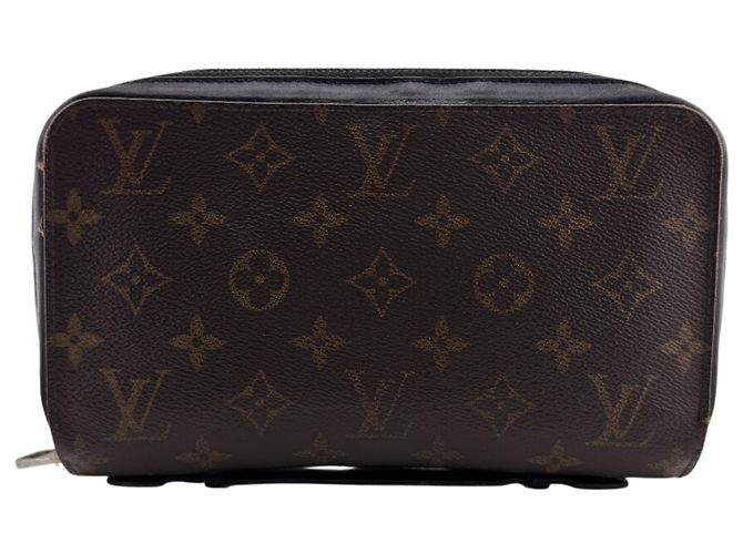 Zippy Braune Leder-Clutch von Louis Vuitton