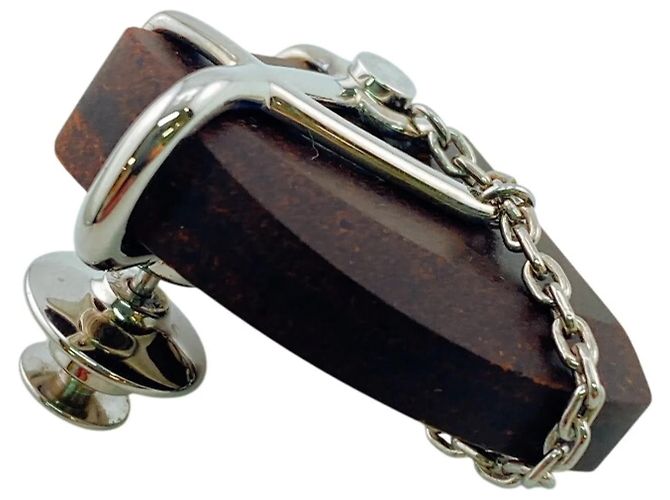 Hermès Brosche mit braunem Pferdemotiv