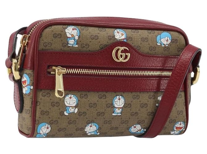 Gucci Bolsa Doraemon Micro GG Supreme em PVC bege e dourado 647784 Auth ka3475SAM