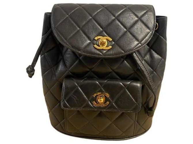 Timeless CHANEL Mochila Duma Matelassada Usada (1997)