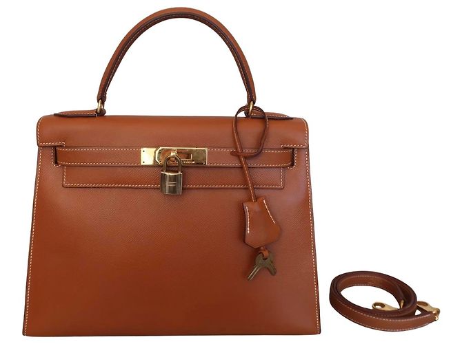 Bolsa Hermès Kelly em Courchevel marrom com hardware dourado 28