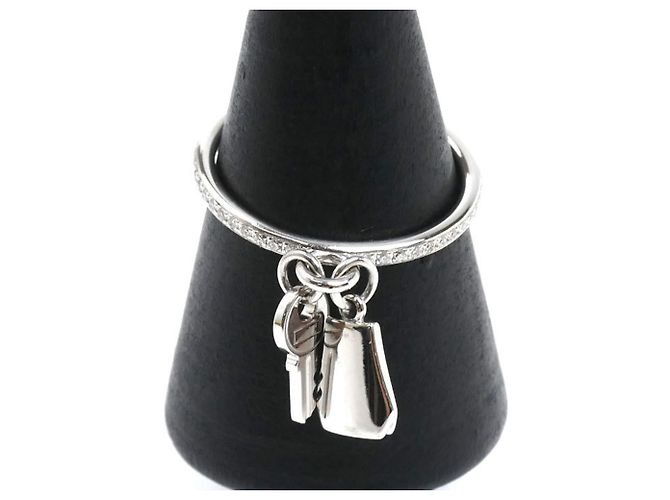 Hermès Anillo Clochette PM Hermes Kelly en oro blanco de 18K 