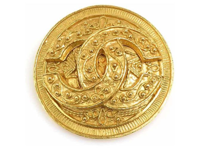 Timeless Broche de metal dorado Chanel