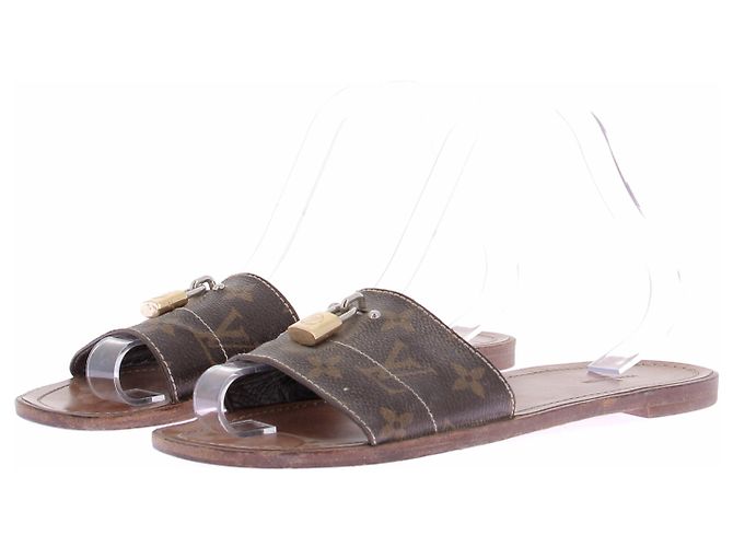 Louis Vuitton Mules "Lock It" en toile monogrammée Marron