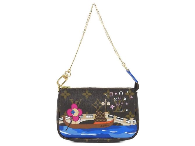 Vivienne Louis Vuitton Monogram Mini Pochette Accessoires Brown