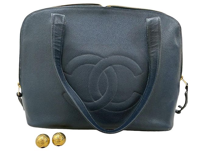Bolso tote de cuero Chanel azul marino con herrajes dorados