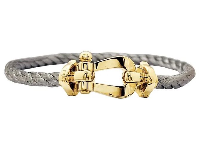 Bracelete Fred, 'Força 10', ouro amarelo, aço.