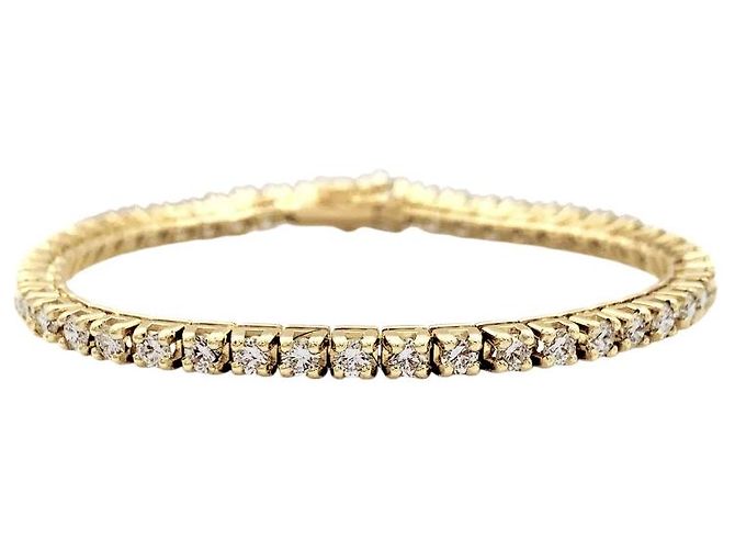 Autre Marque Bracciale a linea in oro giallo e diamanti.