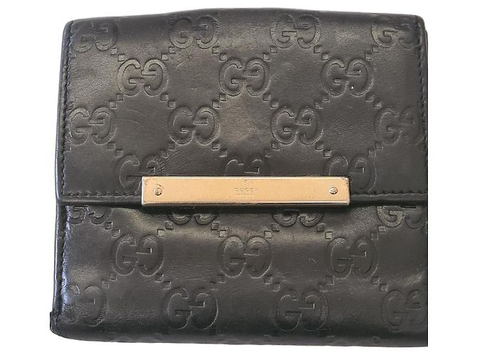 Gucci black leather wallet with embossed GG