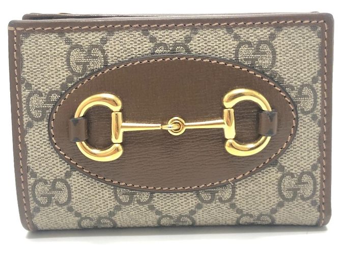 Gucci GG Supreme Brown Bi-fold Wallet