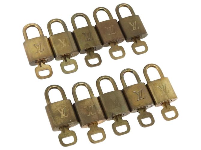 LOUIS VUITTON Set di 10 Lucchetti in metallo Oro LV Auth am11193 D'oro