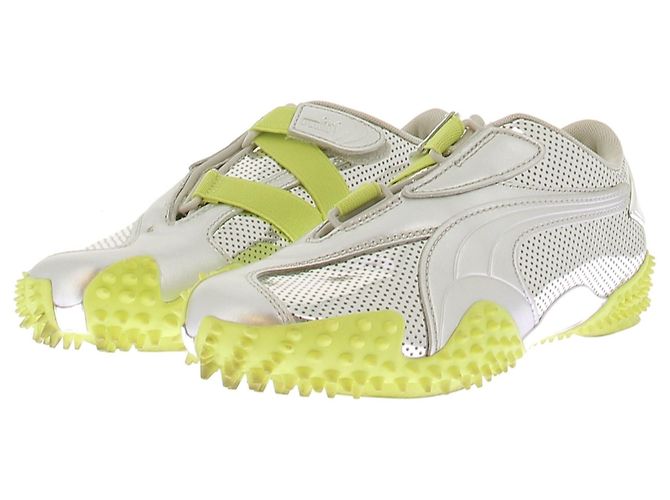 Autre Marque Baskets PUMA x OTTOLINGER Argentées en Cuir Doré