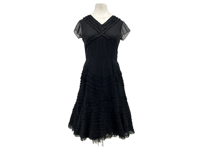 Autre Marque Schwarzes Kleid mit Seidenunterrock