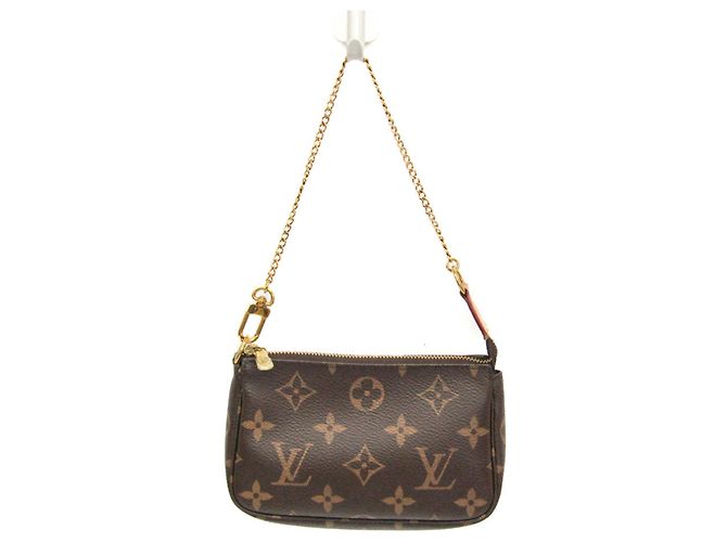 Mini Pochette Accesorios Monograma Louis Vuitton Castaño