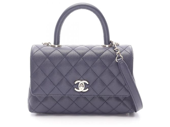 Chanel Coco Handle Flap Handtasche Lila