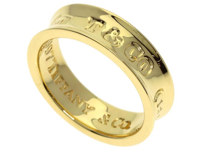 Anello Tiffany & Co. 1837 in oro giallo 18K