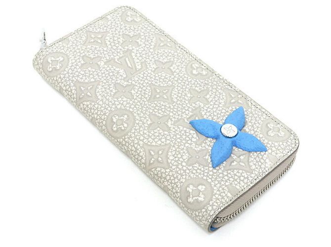 Cartera Zippy Climbing en Taurillon Louis Vuitton Blanco