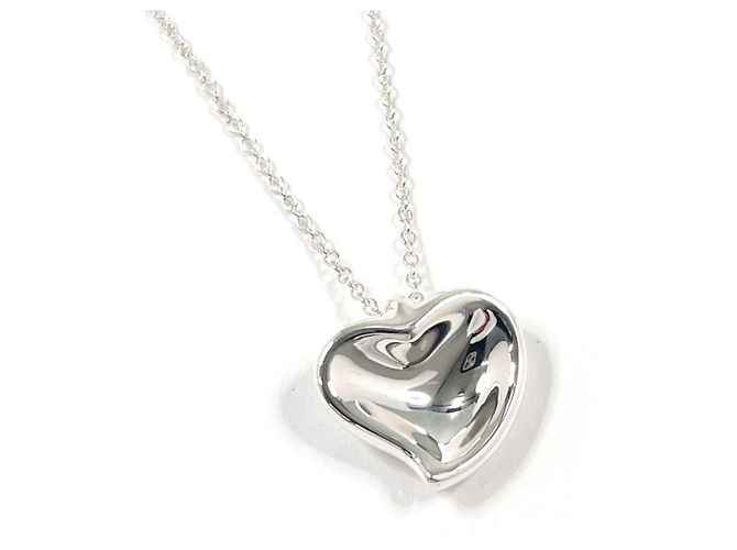 Tiffany & Co. Halskette mit gebogenem Herz von Elsa Peretti. Silber