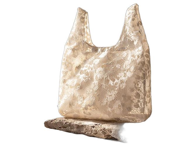 Bolsa shopper assinada Balenciaga em renda marfim/creme.