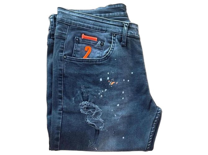Calça Dsquared2 cinza desbotada com respingos de tinta e patch Multicor