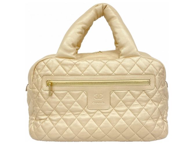 Bolsa tote Coco Cocoon da Chanel Dourado