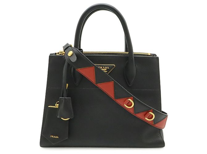 Bolsa de mão Prada Paradigm em couro Saffiano Preto
