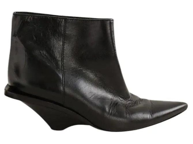 Yves Saint Laurent Botas negras Negro