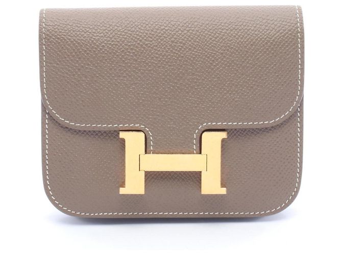 Billetera bi-fold slim Constance de Hermès Castaño Gris pardo