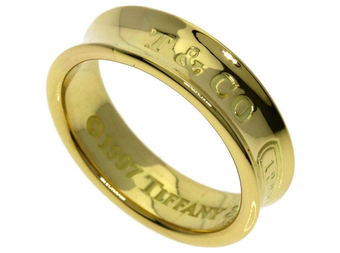 Anello Tiffany & Co. 1837 in oro giallo 18K