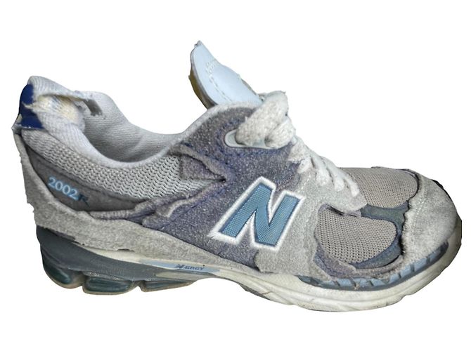 Baskets New Balance 2002R Blanc Bleu Gris