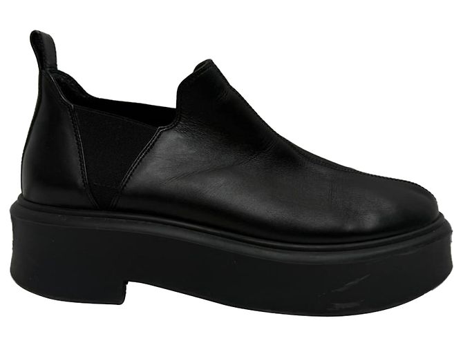 The Row Robin Flatform Ankle Boots in Black Leather