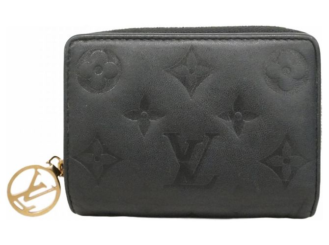 Coussin Cartera Lou de cuero Monogram grabado Louis Vuitton Negro