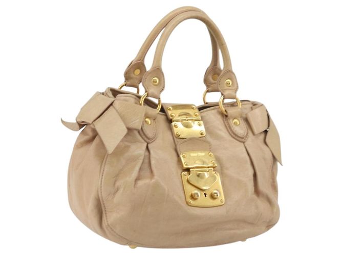Sac à main Miu Miu en cuir beige doré Auth 175444A
