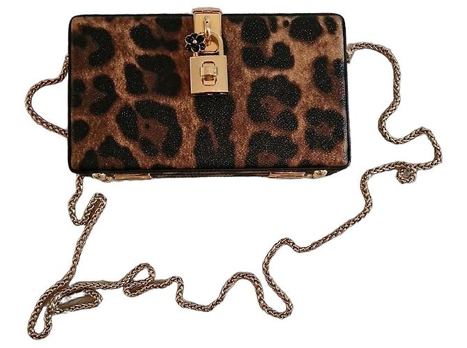 Dolce & Gabbana Clutch de leopardo com corrente dourada Dourado Estampa de leopardo