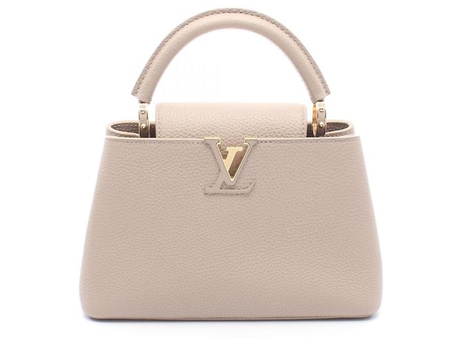 Bolsa Capucines BB Louis Vuitton Bege